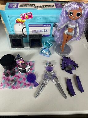 L.O.L. Surprise! Doll with Purple Hair & Silver Outfit and Purple Accessories